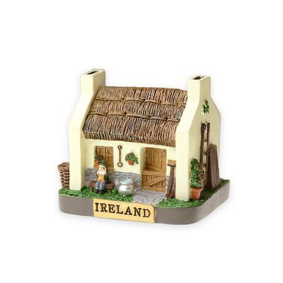 Tigeen Small Irish Cottage With Thatched Roof And Man Playing Music