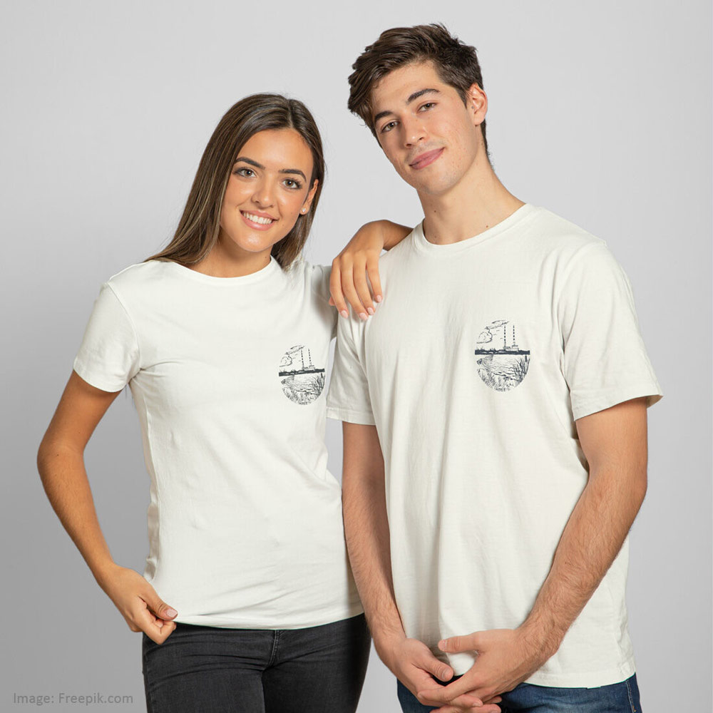 Male and female model pose wearing Green Island Poolbeg unisex t-shirt in cream